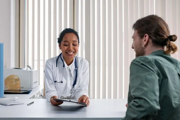 Person reviewing insurance documents and coverage options for GLP-1 medications